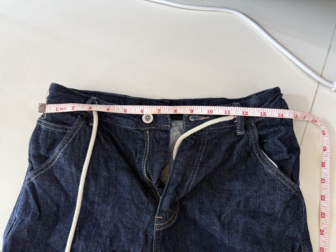 Dark wash denim jeans with drawstring waist (Category: Jeans) located in Taguig. Submitted by ellieelles (Listing ID 1469441378, Image 3). Description: - Dark denim jeans with a cozy grey fleece-like lining for extra warmth - Adjustable white drawstring waist with secure zip fly - Classic straight leg fit with stylish contrast stitching - Waist (flat): ~14 to 15 inches - Total length: ~39 inches down the side - Perfect for chilly days and casual 