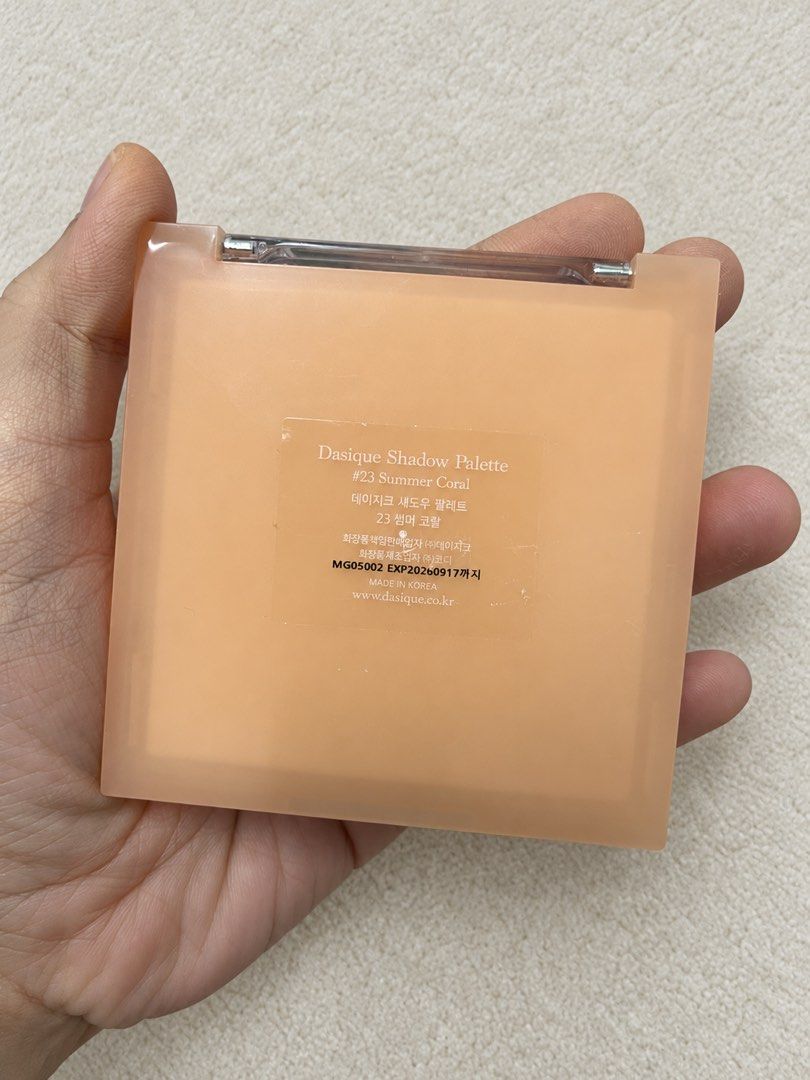 Dasique Shadow Palette (#23 Summer Coral) (Category: Makeup) located in Cagayan de Oro. Submitted by simplydecluttering_makeup (Listing ID 1469495842, Image 3). Description: - Brand: Dasique - Item: 18-Color Eyeshadow Palette in #23 Summer Coral - Shades: Gorgeous mix of matte and soft pinks, warm oranges, and browns - Condition: Swatched once or twice, barely touched; minimal wear on case - Reason for selling: Decluttering my makeup collection.