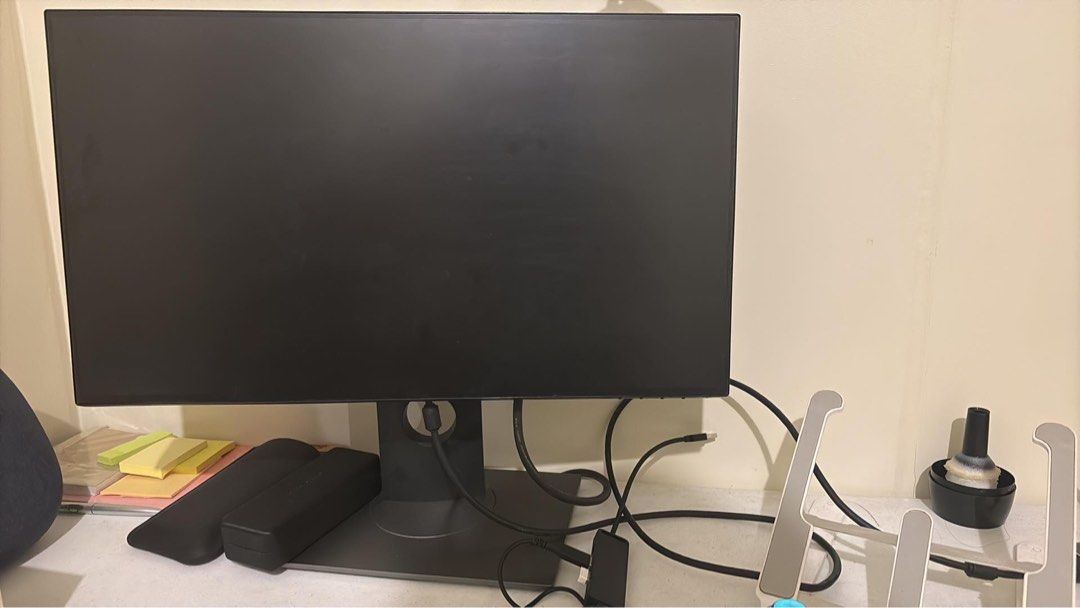 Dell Computer Monitor with Stand (Category: Monitor Screens) located in Manila. Submitted by loislane112233 (Listing ID 1469497756, Image 1). Description: - Brand: Dell 24 inch - Color: Dark Grey - Stand: Fully adjustable - Condition: Clean screen with minimal wear - Included: Attached power cable and USB-C cable - Ideal for: Office work or home office desk setups - Reason for selling: Changing gear.