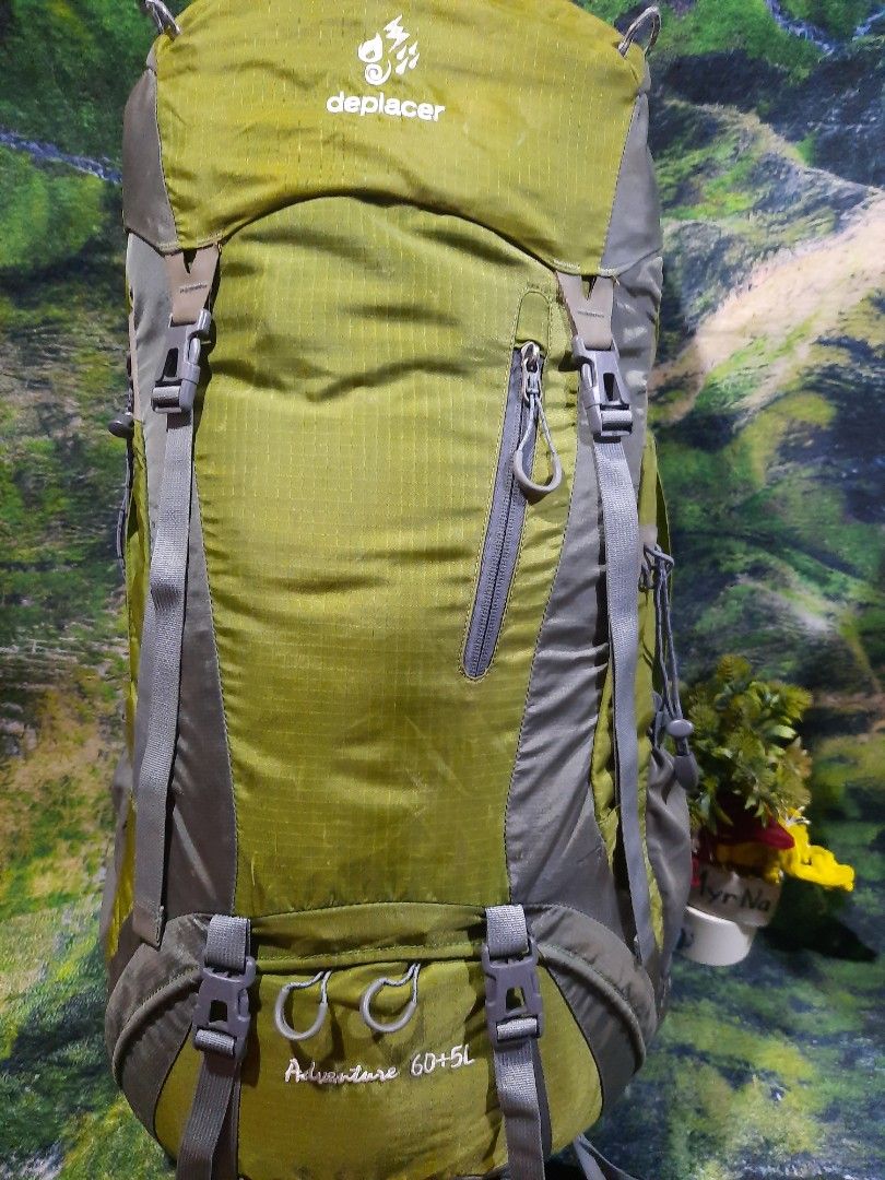 deplacer adventure 60+5l hiking backpack green (Category: Backpacks) located in Baguio. Submitted by klayblakeb87803 (Listing ID 1469467631, Image 2). Description: - Brand/Model: Deplacer Adventure Hiking Backpack - Capacity: 60+5 Liters (Large capacity with drawstring closure and top lid buckles) - Color: Green and Grey - Organization: Multiple zippered exterior pockets and side compression straps - Comfort: Padded shoulder straps and sturdy hip