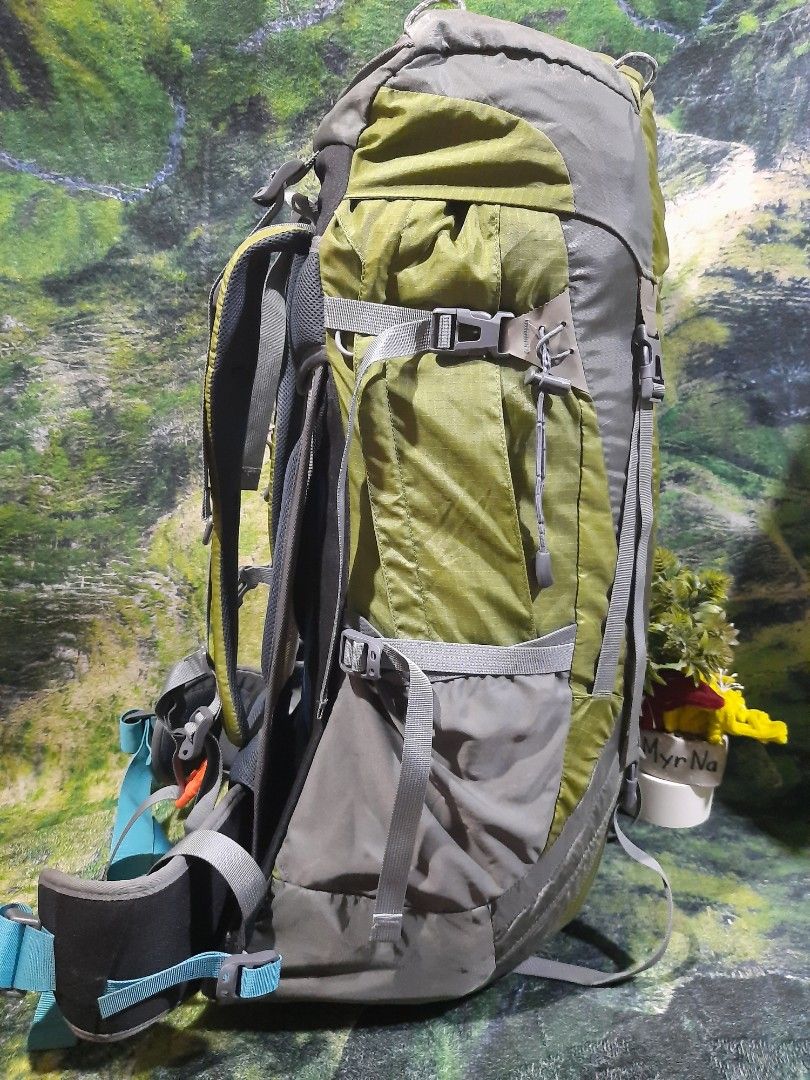 deplacer adventure 60+5l hiking backpack green (Category: Backpacks) located in Baguio. Submitted by klayblakeb87803 (Listing ID 1469467631, Image 1). Description: - Brand/Model: Deplacer Adventure Hiking Backpack - Capacity: 60+5 Liters (Large capacity with drawstring closure and top lid buckles) - Color: Green and Grey - Organization: Multiple zippered exterior pockets and side compression straps - Comfort: Padded shoulder straps and sturdy hip