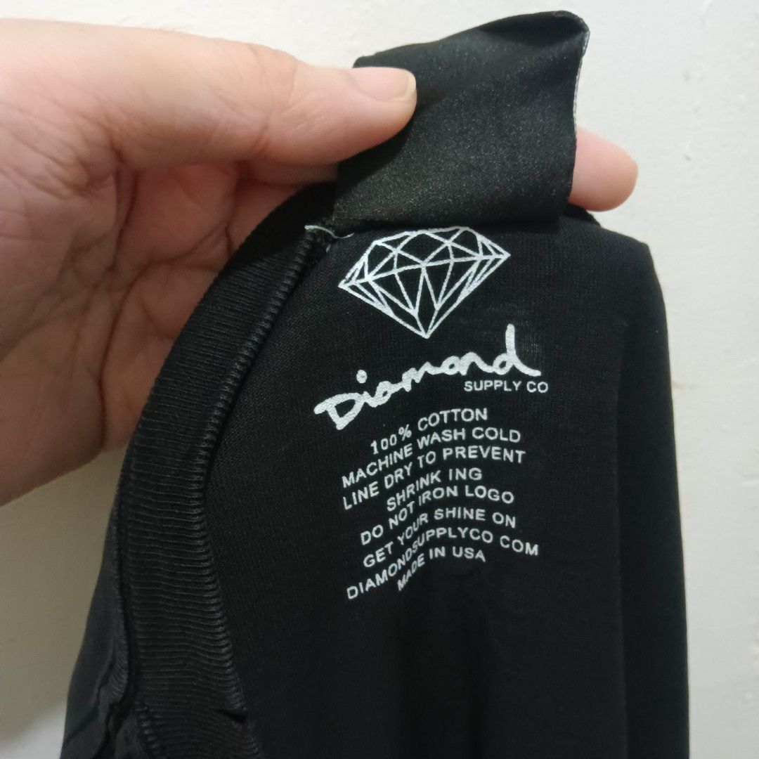 DIAMOND SUPPLY CO. Graphic Shirt (Category: Tshirts & Polo Shirts ) located in Caloocan City. Submitted by jaychingsss (Listing ID 1469498252, Image 3). Description: Diamond Supply Co Shirt - 150 21x29 Color Rate: 9.5/10 No issue Like New Condition With Necktag, Cut Washtag NEED WASH.