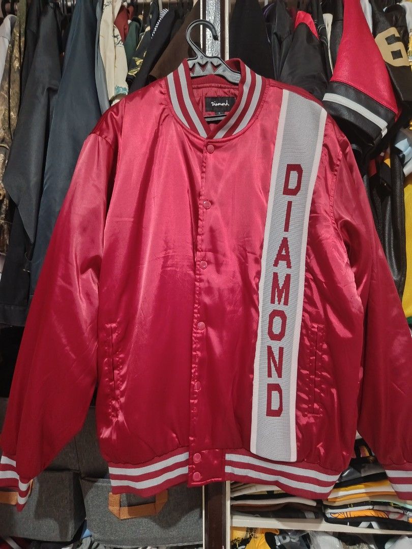 Diamond Supply Co. Red Satin Varsity Bomber Jacket (Category: Coats, Jackets and Outerwear) located in Manila. Submitted by westcity.mnl (Listing ID 1469534910, Image 1). Description: Diamond stadium jacket Large Brandnew condition Not ukay Location Sampaloc Manila .