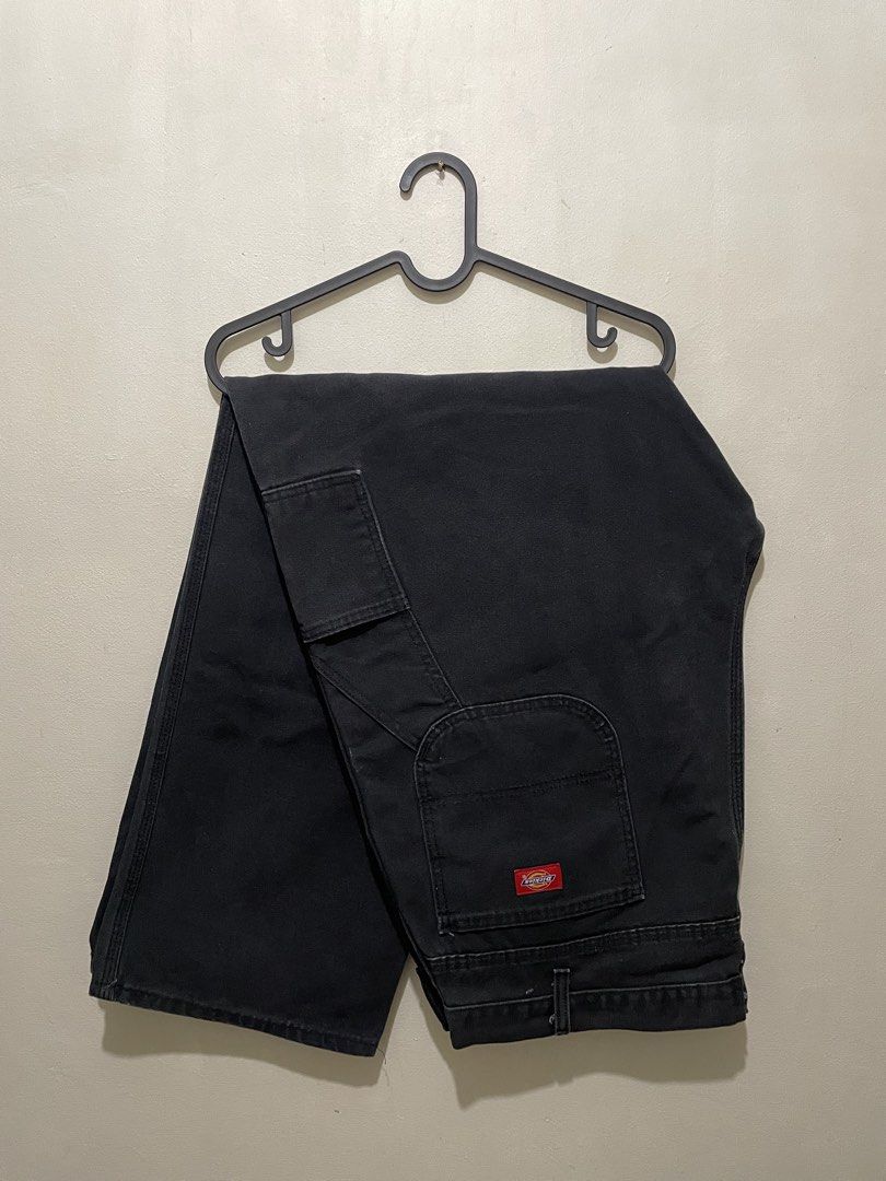 Dickies Black Workwear Pants Carpenter Jeans (Category: Jeans) located in Manila. Submitted by bigboyzcloset (Listing ID 1469419078, Image 1). Description: - Brand: Dickies - Item: Carpenter Pants - Color: Black - Material: Heavy-duty cotton canvas - Features: Utility pockets, hammer loop, branded metal hardware, and red logo patch - Fit: Regular fit with standard belt loops - Condition: Minor fading from regular use, durable and still has plenty