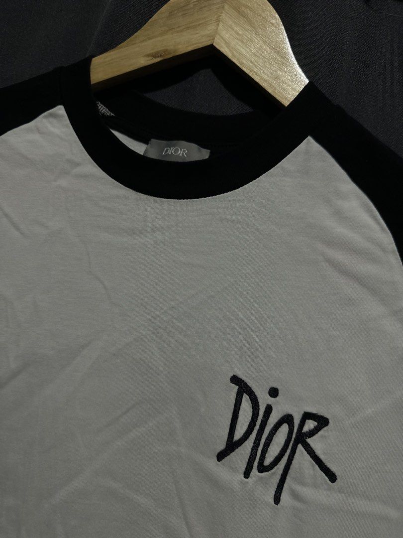 Dior Raglan Script Logo Tee (White / Black) (Category: Tshirts & Polo Shirts ) located in Buenavista. Submitted by themodernrack (Listing ID 1469510101, Image 2). Description: NOTE: Details on photos provided, kindly check thank you Condition: Excellent condition Measurements & Sizing: Size: Tagged Size S Width (Pit to Pit): 19” Length: 28”.