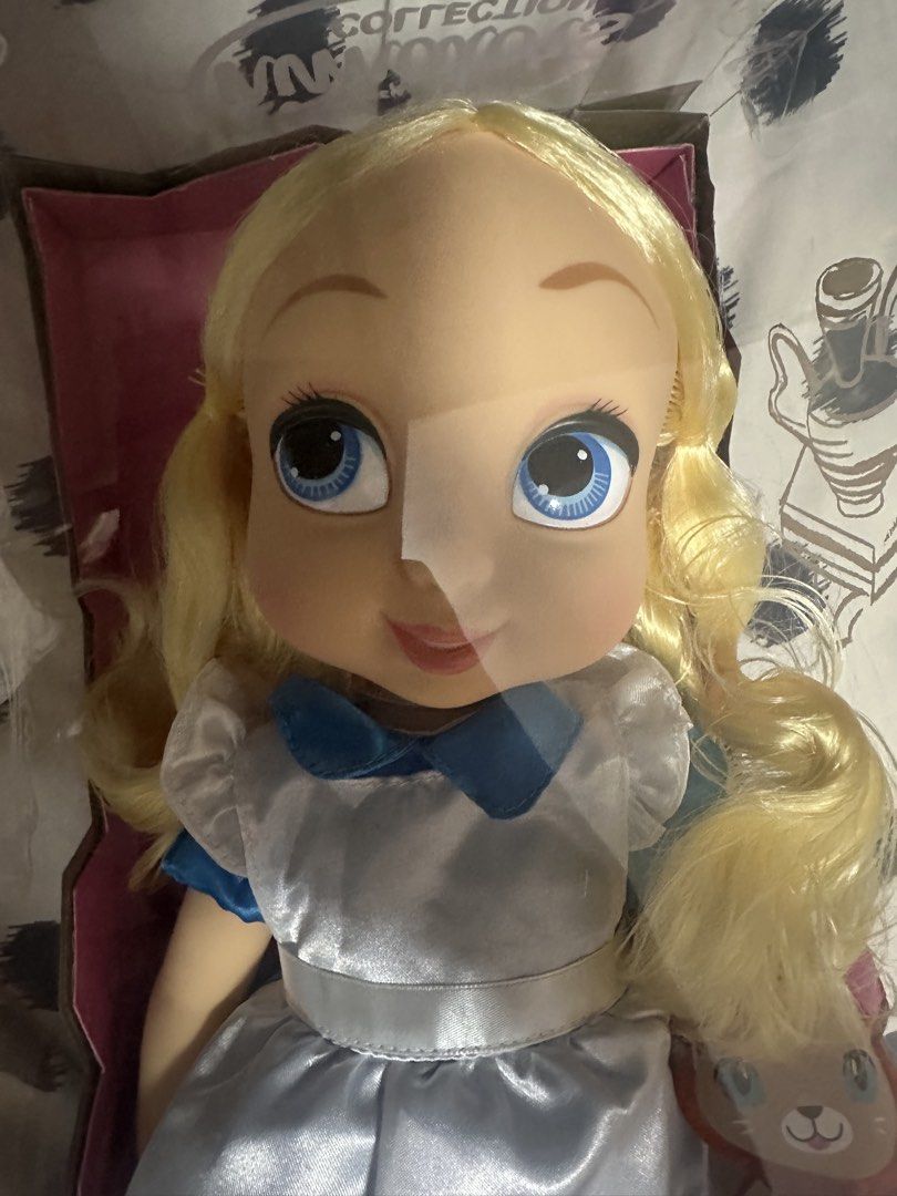Disney Animators' Collection Alice Doll (Category: Plushies & Soft Toys) located in General Trias. Submitted by timeo99 (Listing ID 1469556809, Image 2). Description: - Official Disney Animators Collection Alice Doll - Features iconic blonde hair and blue eyes - Wears her classic blue and white dress with delicate lace trim - Comes brand new in original, intact packaging - Includes a cute small plush companion inside the box - Perfect for Disney 