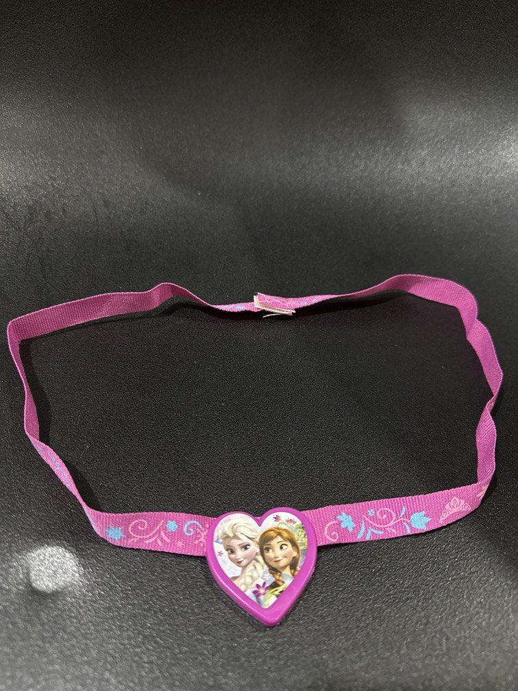 Disney Frozen Charm Necklace (Category: Babies & Kids Fashion) located in Manila. Submitted by krystalchewey_ (Listing ID 1469474628, Image 2). Description: Bnew Actual Photo Posted 89php Dimensions: Approximately 61 cm (24 inches) long with a 3.8 cm charm.