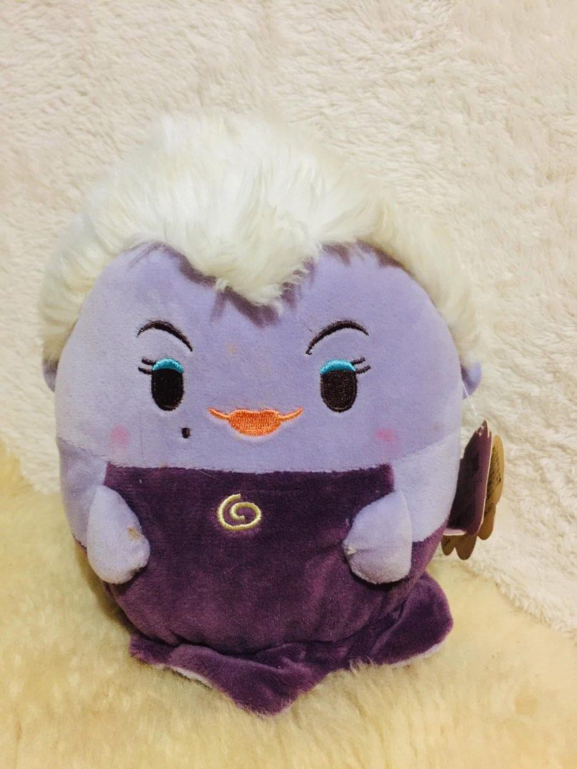 Disney Ufufy Ursula Plush Toy (Category: Plushies & Soft Toys) located in Baguio. Submitted by izza_thrifty (Listing ID 1469516692, Image 1). Description: - Authentic Disney Ufufy Ursula plush toy from The Little Mermaid - Features a soft purple body, white fuzzy hair, and embroidered seashell necklace detail - Original hanging tag with Disney Ufufy rainbow branding included - Super soft fabric texture all over - Pristine, clean condition with no