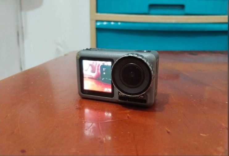 DJI Osmo Action 1 4K Camera with Accessories (Category: Cameras) located in Cebu City. Submitted by youngjus27 (Listing ID 1469432287, Image 1). Description: - Model: DJI Osmo Action Camera - Video/Features: 4K resolution, dual screens (front & rear), RockSteady stabilization - Condition: Fully working screens and functions, minor paint wear on the lens ring - Included Accessories: Waterproof housing, frame mount, battery charger hub, extra batte