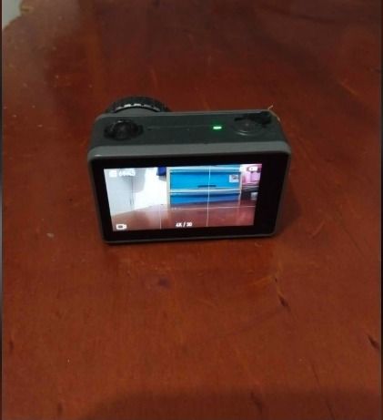 DJI Osmo Action 1 4K Camera with Accessories (Category: Cameras) located in Cebu City. Submitted by youngjus27 (Listing ID 1469432287, Image 2). Description: - Model: DJI Osmo Action Camera - Video/Features: 4K resolution, dual screens (front & rear), RockSteady stabilization - Condition: Fully working screens and functions, minor paint wear on the lens ring - Included Accessories: Waterproof housing, frame mount, battery charger hub, extra batte