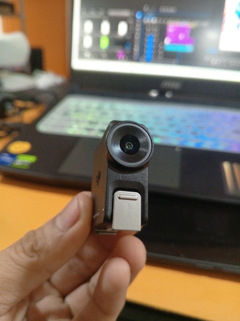 DJI RS Enhanced Intelligent Tracking Module (Category: Video Cameras) located in Manila. Submitted by franciscoo91672 (Listing ID 1469403460, Image 2). Description: - Authentic DJI RS Enhanced Intelligent Tracking Module - Compact black body featuring an integrated tracking camera lens - Clean bottom connector pins and side USB-C port - Fully functional and ready to mount on your gimbal rig.