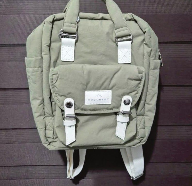 Doghnut Macaron (Category: Backpacks) located in General Trias. Submitted by relove_closet8 (Listing ID 1469504737, Image 1). Description: •Selling my authentic, preloved Doughnut Macaroon Mini from the special Beyond The Horizon series. • Size: 30cm H x 21.5cm W x 9cm D (7 Liters) • Material: Water-repellent nylon shell with genuine leather details • Buyer handles shipping fee and book J&T or Lalamove only. • Payment first via bank transfer or e