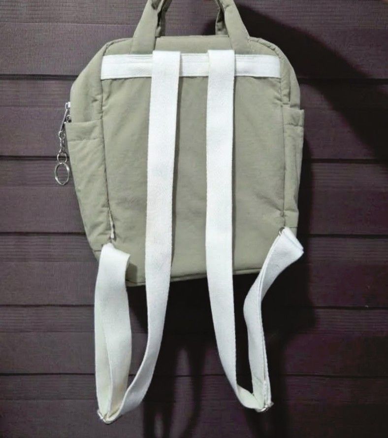 Doghnut Macaron (Category: Backpacks) located in General Trias. Submitted by relove_closet8 (Listing ID 1469504737, Image 2). Description: •Selling my authentic, preloved Doughnut Macaroon Mini from the special Beyond The Horizon series. • Size: 30cm H x 21.5cm W x 9cm D (7 Liters) • Material: Water-repellent nylon shell with genuine leather details • Buyer handles shipping fee and book J&T or Lalamove only. • Payment first via bank transfer or e