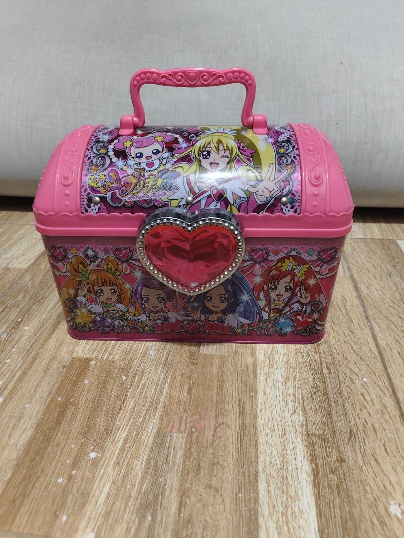 Dokidoki Precure Pink Tin Storage Box (Category: Storage Boxes & Baskets) located in Makati City. Submitted by abegailbrezuela (Listing ID 1469430088, Image 2). Description: - Official Doki Doki Precure merchandise - Cute pink metal chest with clear pink heart snap clasp - Convenient plastic top handle for easy carrying - Clean, empty pink metal interior - Features original Japanese product label and barcode on the back - Ideal collector's item f