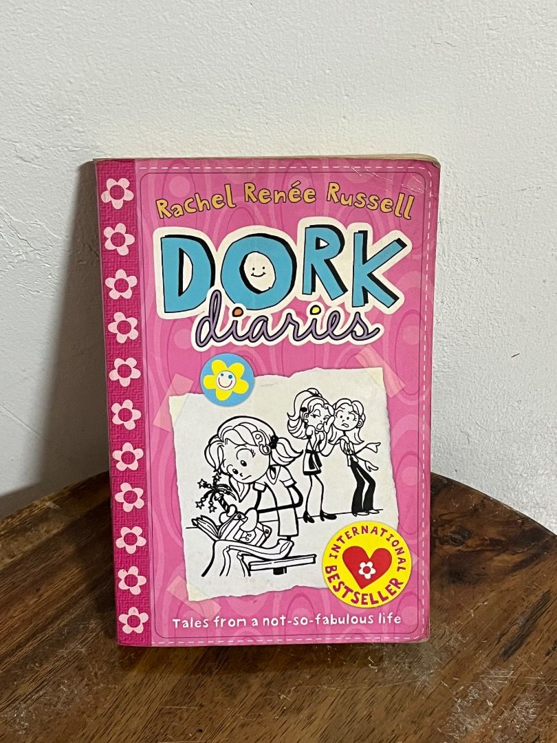 Dork Diaries Book Bundle (Category: Children's Books) located in Cabuyao City. Submitted by rdtrmt (Listing ID 1469412885, Image 3). Description: - Set of 4 Dork Diaries books by Rachel Renée Russell - Includes popular titles like Party Time, Skating Sensation, and Pop Star - Fun and engaging reads for kids, teens, and young at hearts - Condition: Pre-loved paperbacks with minor shelf wear on edges - Inside pages are clean and well-maintained but