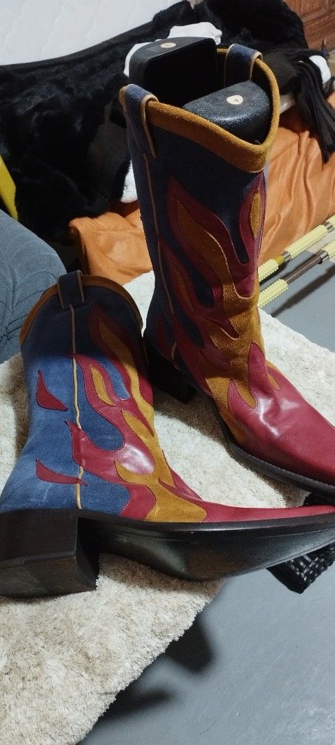 DSQUARED2 Multicolour Flame Western Leather Boots Size 43 (Category: Boots) located in Manila. Submitted by warmwind-f36c (Listing ID 1469431917, Image 3). Description: DSQUARED2 Blue Suede Flame Cowboy Boots (Rare Y2K Era) Price: ₱22,000 (Slightly negotiable for fast transac) Size: EU 43 / US Men's 10 (Golden Size) Condition: 8.5/10 very clean suede, minor sole wear] Origin: Made in Italy 🇮🇹 Details: Selling a highly sought-after, rare archiva