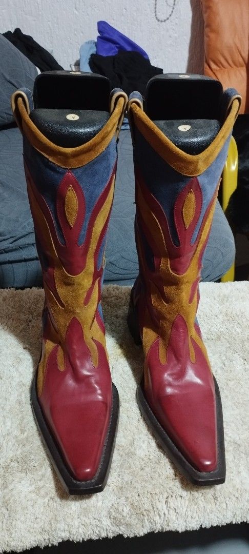 DSQUARED2 Multicolour Flame Western Leather Boots Size 43 (Category: Boots) located in Manila. Submitted by warmwind-f36c (Listing ID 1469431917, Image 1). Description: DSQUARED2 Blue Suede Flame Cowboy Boots (Rare Y2K Era) Price: ₱22,000 (Slightly negotiable for fast transac) Size: EU 43 / US Men's 10 (Golden Size) Condition: 8.5/10 very clean suede, minor sole wear] Origin: Made in Italy 🇮🇹 Details: Selling a highly sought-after, rare archiva