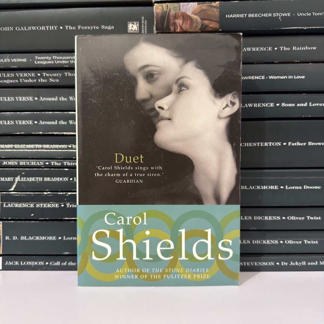 Duet by Carol Shields Paperback Novel (Category: Storybooks) located in Lingayen. Submitted by readwjane (Listing ID 1469478479, Image 1). Description: - Title: Duet - Author: Carol Shields (Pulitzer Prize winner) - Format: Standard paperback with clean pages - Cover feature: Includes a praise quote from The Guardian - Genre: Contemporary fiction and character-driven stories - Condition: Excellent, clean pages ready to read.