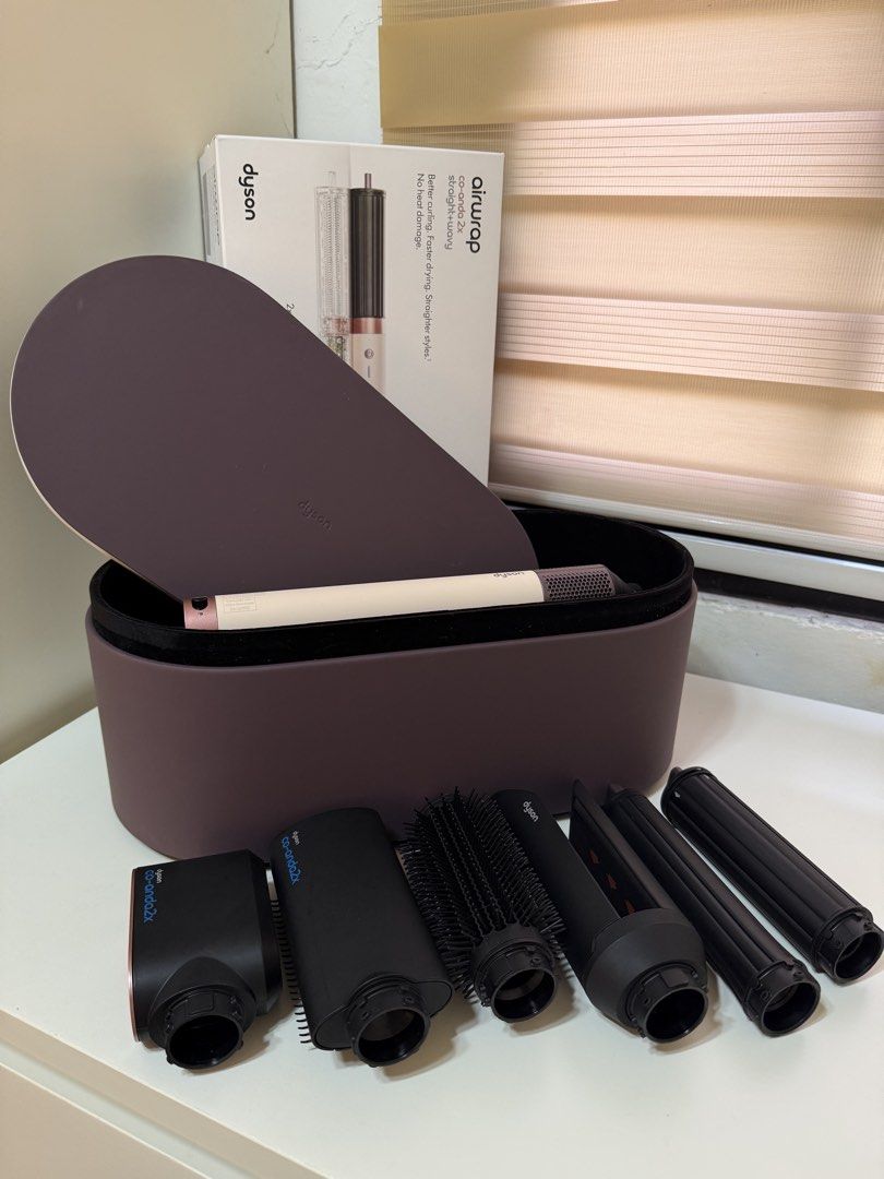 Dyson Airwrap Co-Anda 2x (Category: Hair) located in Baliuag. Submitted by keithyy_ (Listing ID 1469572756, Image 3). Description: Almost brand new. Used a few times lang. bought May 2026 (this yr) With receipt for 2yr warranty :) Rfs: mostly travelling.