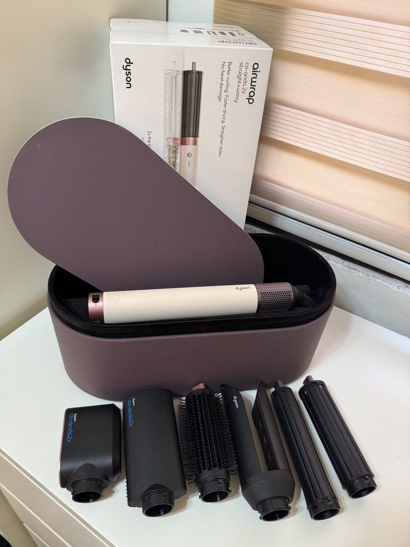 Dyson Airwrap Co-Anda 2x (Category: Hair) located in Baliuag. Submitted by keithyy_ (Listing ID 1469572756, Image 2). Description: Almost brand new. Used a few times lang. bought May 2026 (this yr) With receipt for 2yr warranty :) Rfs: mostly travelling.