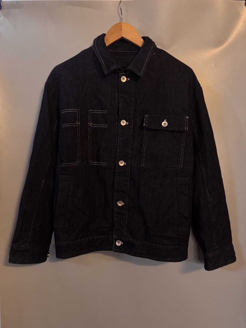 Ecko Unltd Dark Denim Jacket (Category: Coats, Jackets and Outerwear) located in Alaminos. Submitted by outfitcheck.ph (Listing ID 1469528202, Image 1). Description: - Brand: Ecko Unltd. - Color/Wash: Clean dark denim wash - Material: 57.5% cotton, 21.4% viscose, 20.1% polyester, 1% spandex (with slight stretch) - Design: Button-up front with metallic silver hardware and contrast white stitching - Pockets: Multiple functional patch pockets on the