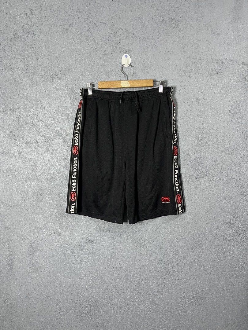 Ecko Unltd Ecko Function Black Mesh Shorts Size L (Category: Shorts) located in Famy. Submitted by basicthrifted (Listing ID 1469404733, Image 1). Description: - Brand: Ecko Function - Size: Large - Color: Black - Material: Breathable athletic mesh - Waistband: Elastic with drawstring closure - Pockets: Convenient side pockets - Details: Bold logo side taping and embroidered rhino logo on lower left leg - Condition: Excellent / Ready to wear.