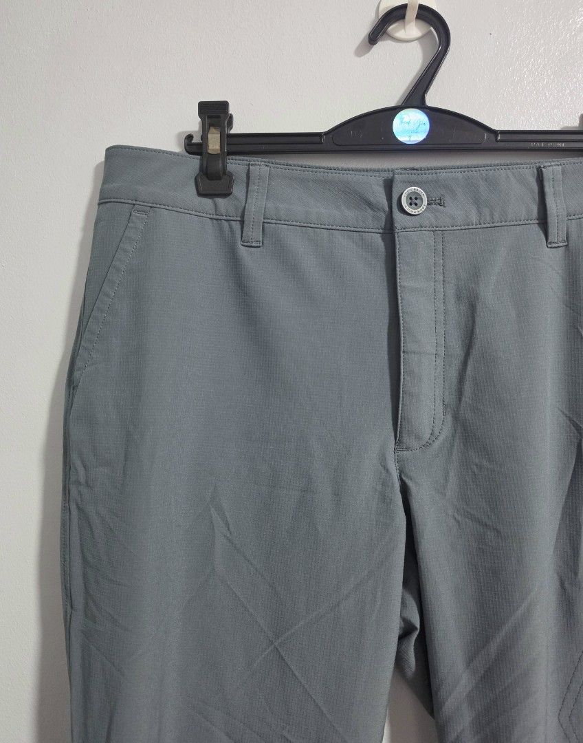 Eddie Bauer Grey Cargo drifit pants (Category: Other Bottoms) located in Paranaque City. Submitted by franinnashop (Listing ID 1469451921, Image 3). Description: Declutter - Brand: Eddie Bauer - Color: Grey - Size/Measurements: Waist 34-35", Hips 40", Length 33", Inseam 23" - Features: Secure zippered thigh pockets, adjustable drawstrings at cuffs - Details: Button closure with zip fly, belt loops, and standard back pockets - Condition: Excellent