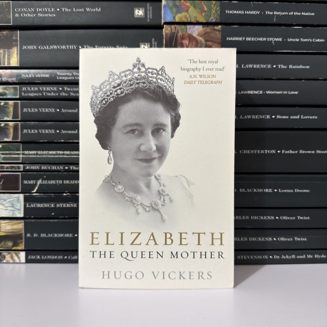 Elizabeth The Queen Mother by Hugo Vickers (Category: Storybooks) located in Lingayen. Submitted by readwjane (Listing ID 1469478321, Image 1). Description: - Title: Elizabeth The Queen Mother - Author: Hugo Vickers - Format: Paperback - Condition: Clean cover with a portrait of the Queen Mother in her crown - Features a quote from the Daily Telegraph on the front - Ideal read for history buffs and royal family enthusiasts.