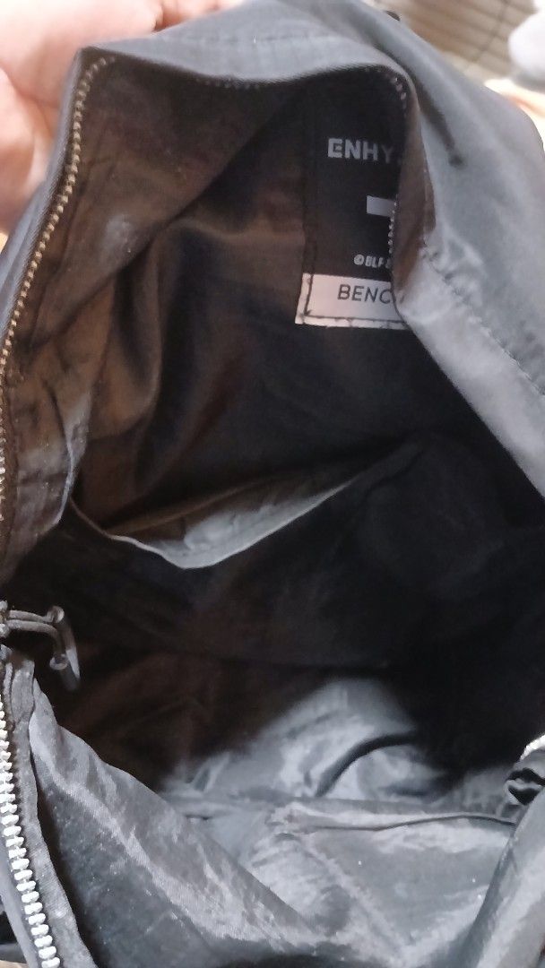ENHYPEN x Bench Black Nylon Backpack (Category: Backpacks) located in Taguig. Submitted by jegadablo (Listing ID 1469501102, Image 2). Description: - Official ENHYPEN x Bench collaboration backpack - Color: Classic black nylon - Compartments: Main zip compartment and exterior front zip pocket - Details: Interior label with official ENHYPEN, Bench, and HYBE branding - Condition: Clean inside and out, lightweight and practical for daily use.