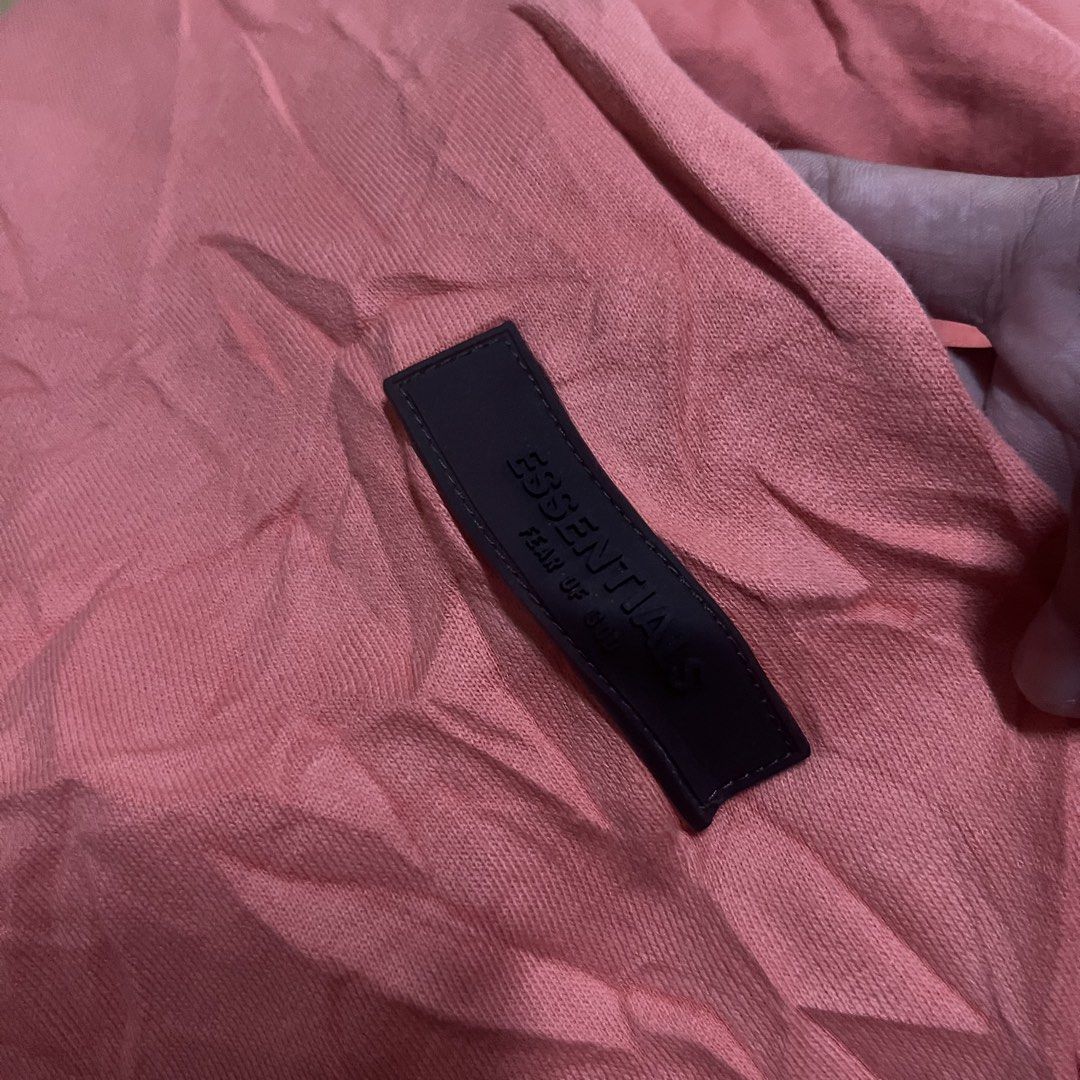 ESSENTIALS FOG HOODIE (Category: Activewear) located in Cavite. Submitted by sacmaestro444 (Listing ID 1469542623, Image 3). Description: medium on tag good condition cut main tag bleach stain see last 3pics heavy cotton goods for Psg.
