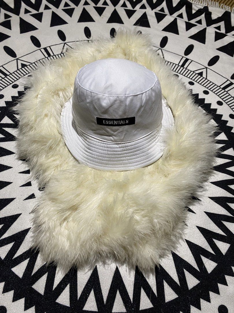 Essentials Reversible Bucket Hat Black White (Category: Activewear) located in Badiangan. Submitted by iralorana.thrift (Listing ID 1469419882, Image 2). Description: - 100% authentic Essentials style - Reversible design: Black with white embroidered logo on side A, white with black rectangular label on side B - Classic streetwear aesthetic suitable for any casual outfit - One size fits most head sizes.