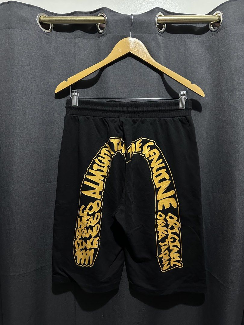 Evisu Graphic Print Drawstring Sweatshorts (Black/Gold) (Category: Shorts) located in Buenavista. Submitted by themodernrack (Listing ID 1469486009, Image 2). Description: NOTE: Details on photos provided, kindly check thank you! Condition: Excellent condition Measurements & Sizing: Waistline (Width): 28” – 34” Length: 23” Leg Opening: 9” .
