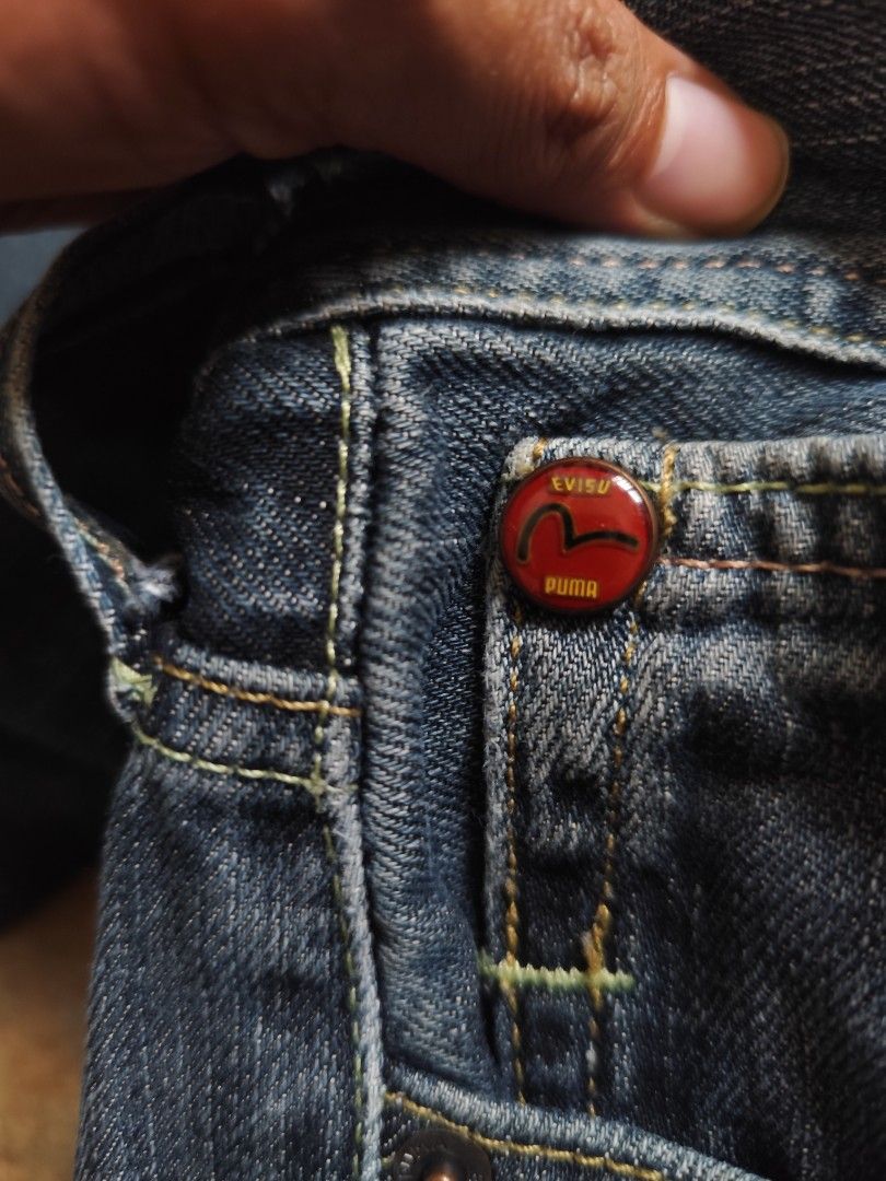Evisu x Puma (Category: Jeans) located in Kabacan. Submitted by thriftpingts (Listing ID 1469436643, Image 3). Description: Evisu x Puma rare vintage selvedge button fly jeans Condition: 10/10 Color rate : 10/10 Waist: 32-34 Length: 41.5 Hem: 9 Washtags: ✅ Issue: ❌.