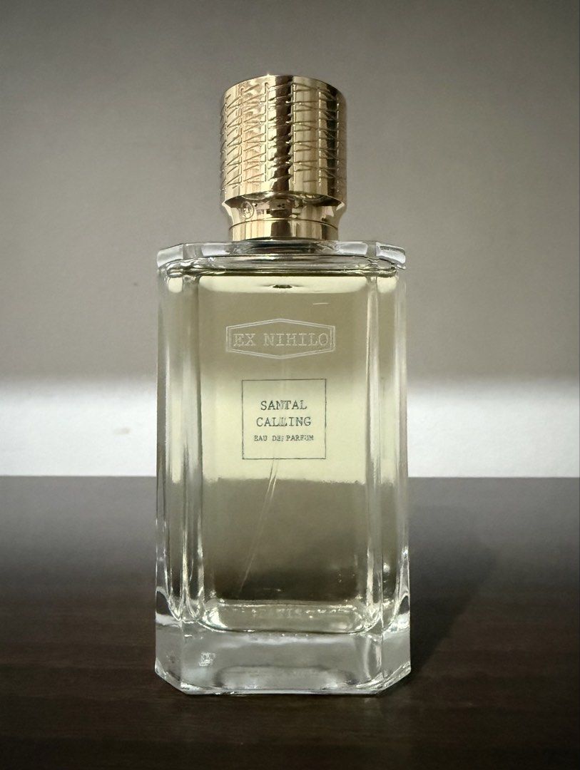 Ex Nihilo Santal Calling Eau de Parfum 100ml (Category: Fragrance & Deodorants) located in Manila. Submitted by pyt_007 (Listing ID 1469487426, Image 3). Description: - Brand: Ex Nihilo - Fragrance: Santal Calling Eau de Parfum - Size: 100ml (FSM only) - Scent Profile: Warm sandalwood with delicate floral and musky notes - Packaging: Includes original outer box and intricate gold/blue presentation case; What you see is what you get - Guaranteed O