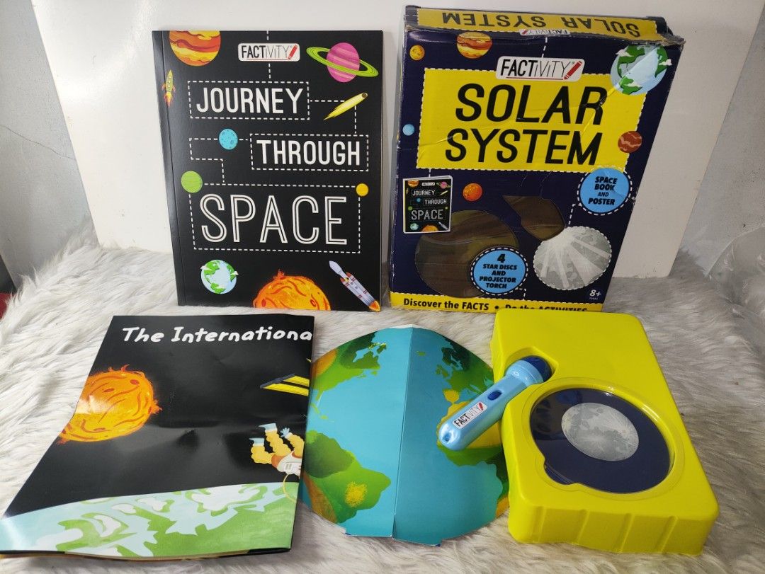 Factivity Journey Through Space Book and Solar System Projector Set (Category: Educational & Learning Toys) located in Cavite. Submitted by tinetaclesss (Listing ID 1469498335, Image 1). Description: - Complete space exploration bundle for young astronomers - Includes Factivity Journey Through Space book filled with facts - Solar system projector torch with 4 interchangeable star discs - Interactive Earth globe foldout and International Space Sta