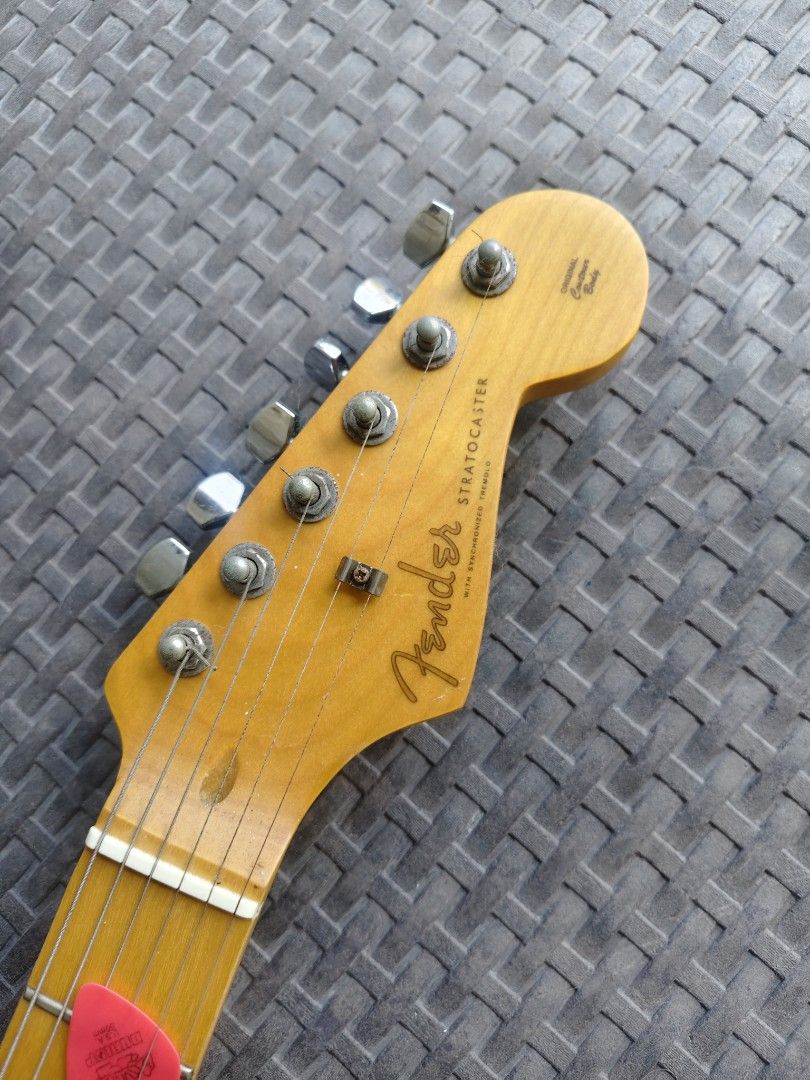 Fender Strat Mint Green copy (Category: Musical Instruments) located in Manila. Submitted by donsantiag93175 (Listing ID 1469401025, Image 2). Description: - For sale Fender Stratocaster copy Low action With Trust rod - Finish: Bright Mint Green with white pickguard and knobs - Neck & Fretboard: Maple with classic skunk stripe - Pickups: 3-single-coil setup for versatile tone - Hardware: Standard tremolo bridge (whammy bar included) and standard 
