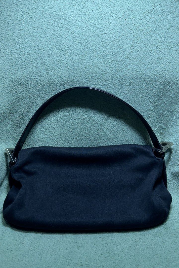 Fendi Neoprene Baguette (Black) (Category: Luxury Bags & Wallets) located in Makati City. Submitted by joshdelrey (Listing ID 1469517050, Image 2). Description: Authentic Fendi Neoprene Baguette (Black) - Has F logo underzip - Sticky texture - Has cracking on the handle 📍Makati .