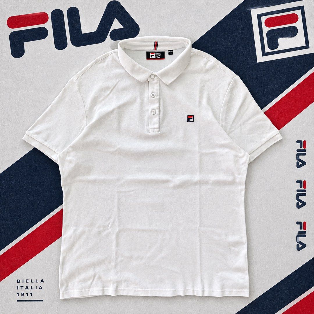 Fila Polo Shirt (Category: Tshirts & Polo Shirts ) located in Bulacan. Submitted by b4mzz (Listing ID 1469466663, Image 1). Description: Fila Classic White Polo 👕 Clean white Fila polo with a classic minimalist design. Perfect for everyday and smart casual fits. 📏 Width: 22” | Length: 28” ✨ Condition: Excellent ✅ No issue 💬 Open for reasonable offers!.