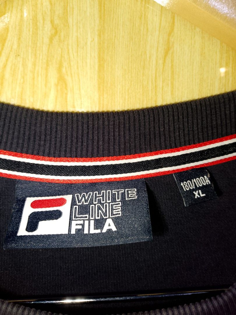 FILA' WHITE LINE EDITION STRETCHABLE SWEATSHIRT (Category: Coats, Jackets and Outerwear) located in Saint Bernard. Submitted by j0h_mhongg (Listing ID 1469507395, Image 3). Description: - DIMES: 23 × 28 - NO ISSUE - GOOD AS NEW CONDITION - 10/10 COLOR RATE - FILA' WHITE LINE EDITION STRETCHABLE SWEATSHIRT.