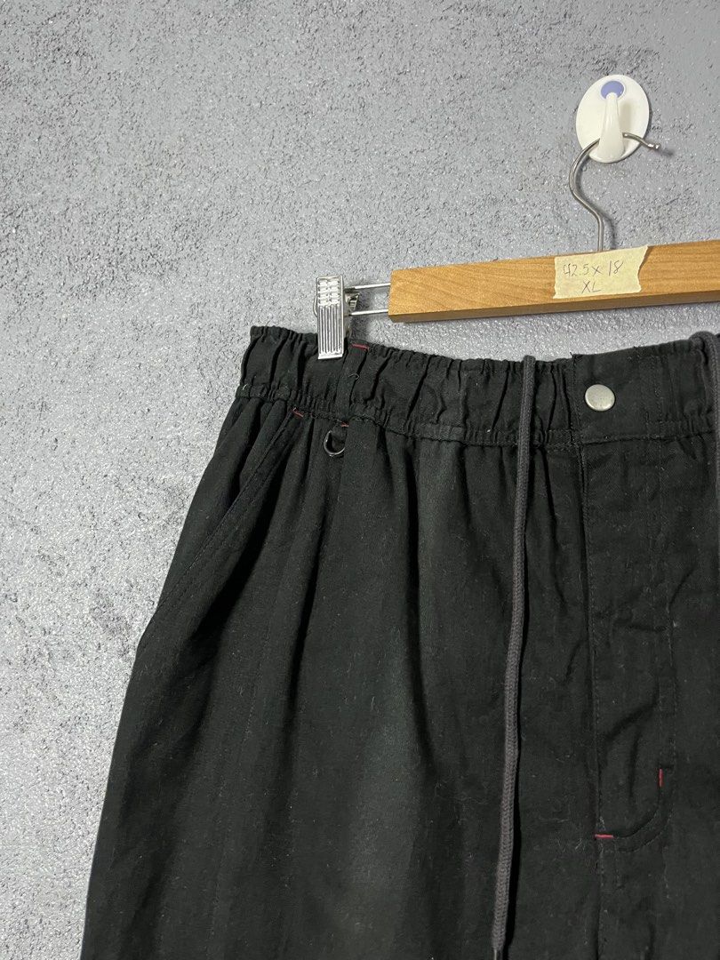 First Down USA Black Cargo Pants XL (Category: Joggers) located in Famy. Submitted by basicthrifted (Listing ID 1469405238, Image 3). Description: - Brand: First Down USA - Style: Black Cargo Pants - Size: XL - Features: Multiple utility pockets, comfortable fit, durable material - Condition: Good pre-owned condition.