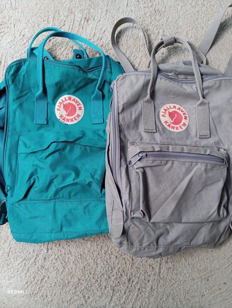 Fjallraven Kanken Backpack Teal and Grey Bundle (Category: Backpacks) located in Sariaya. Submitted by angelochintes732 (Listing ID 1469463509, Image 1). Description: - Authentic Fjallraven Känken backpack bundle (Teal Green and Grey) - Iconic boxy design made from durable, water-resistant Vinylon F fabric - Features a front zipped pocket, top carry handles, and adjustable shoulder straps with fox logo buttons - Includes original interior name la