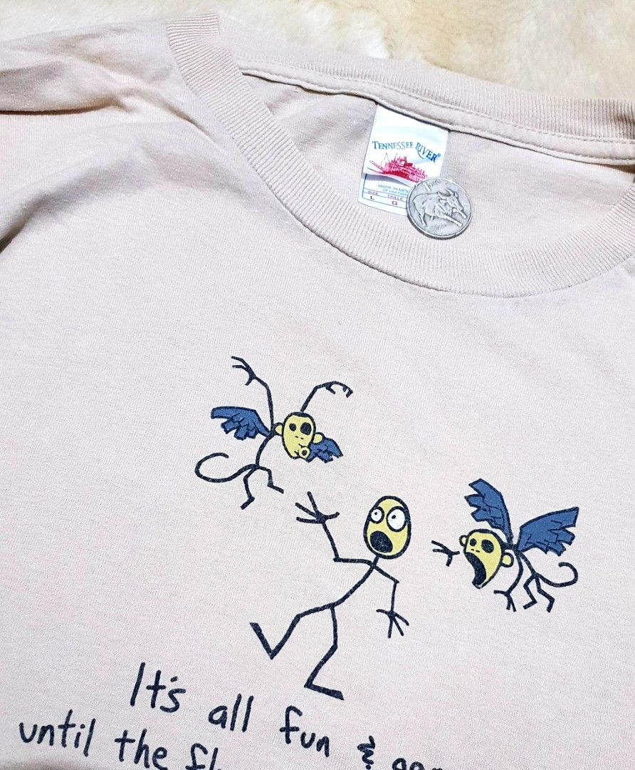 Flying Monkeys (Category: Tshirts & Polo Shirts ) located in Taguig. Submitted by wethrifting2021 (Listing ID 1469510940, Image 3). Description: Item: It's all fun & games until the flying monkeys attack🔥 Size: Tennesse River Hardtag (L) Width: 21 Length: 29 Condition: Excellent Issue: None SWIPE MORE DETAILS. DM to purchase 📩.