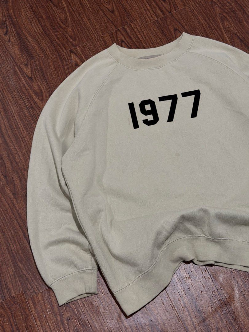FOG - Essentials FOG “1977” Crewneck (Category: Coats, Jackets and Outerwear) located in Taguig. Submitted by shhhhselection (Listing ID 1469555535, Image 2). Description: “Essentials FOG “1977” Crewneck” Authentic XL Width - 26” Length - 28” Excellent Condition No Issue 1498 Pesos Only!.