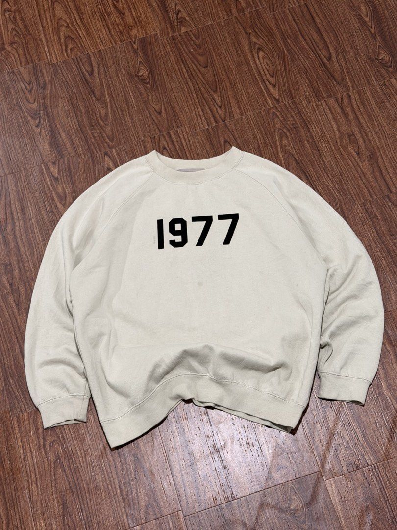 FOG - Essentials FOG “1977” Crewneck (Category: Coats, Jackets and Outerwear) located in Taguig. Submitted by shhhhselection (Listing ID 1469555535, Image 1). Description: “Essentials FOG “1977” Crewneck” Authentic XL Width - 26” Length - 28” Excellent Condition No Issue 1498 Pesos Only!.