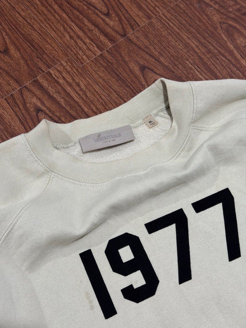 FOG - Essentials FOG “1977” Crewneck (Category: Coats, Jackets and Outerwear) located in Taguig. Submitted by shhhhselection (Listing ID 1469555535, Image 3). Description: “Essentials FOG “1977” Crewneck” Authentic XL Width - 26” Length - 28” Excellent Condition No Issue 1498 Pesos Only!.
