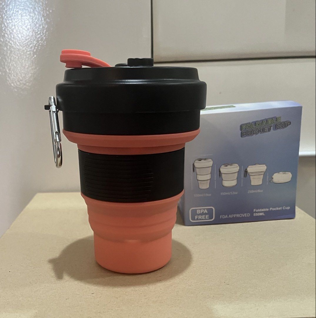 Foldable Pocket Cup 550ml Silicone Travel Mug (Category: Water Bottles & Tumblers) located in Paranaque City. Submitted by tingar08 (Listing ID 1469447776, Image 1). Description: - Capacity: 550ml (collapsible design saves space when empty) - Material: Food-grade silicone and PP, 100% BPA free and FDA approved - Colors: Chic black and pink colourway - Portability: Includes a built-in lid plug and handy side clip for easy carrying - Condition: Bra
