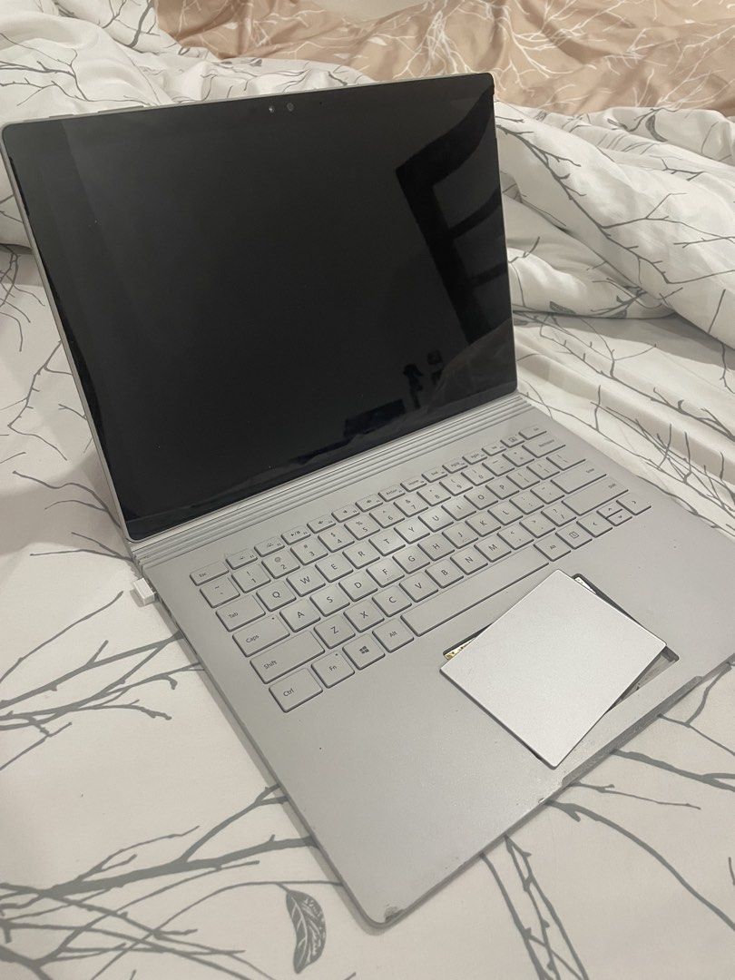 FOR SALE! - Microsoft Surface Book with detached trackpad (Category: Laptops & Notebooks) located in Quezon City. Submitted by urtaurusbby (Listing ID 1469516340, Image 1). Description: 💻 Microsoft Surface Book for sale! Selling my Microsoft Surface Book, a 2-in-1 laptop with a detachable touchscreen that can also be used as a tablet. Great for school, work, browsing, and other everyday tasks, subject to its current condition. Condition: * Scree