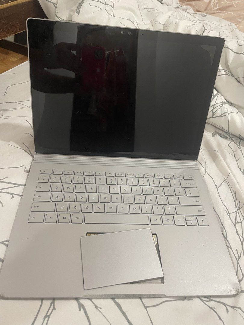 FOR SALE! - Microsoft Surface Book with detached trackpad (Category: Laptops & Notebooks) located in Quezon City. Submitted by urtaurusbby (Listing ID 1469516340, Image 2). Description: 💻 Microsoft Surface Book for sale! Selling my Microsoft Surface Book, a 2-in-1 laptop with a detachable touchscreen that can also be used as a tablet. Great for school, work, browsing, and other everyday tasks, subject to its current condition. Condition: * Scree