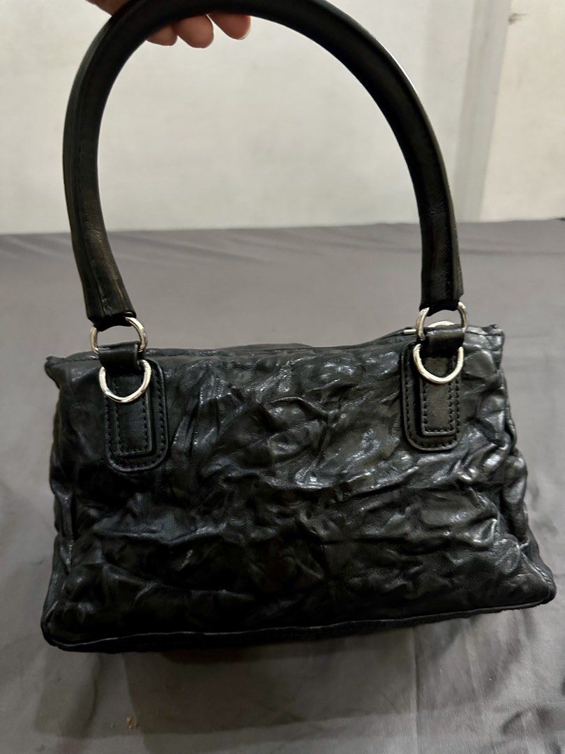For sale Givenchy Pandora Small (Category: Luxury Bags & Wallets) located in Caloocan City. Submitted by mariecarol62420 (Listing ID 1469474859, Image 3). Description: Selling my preloved givenchy pandora small, slighty used like new with dustbag, cards Negotiable.