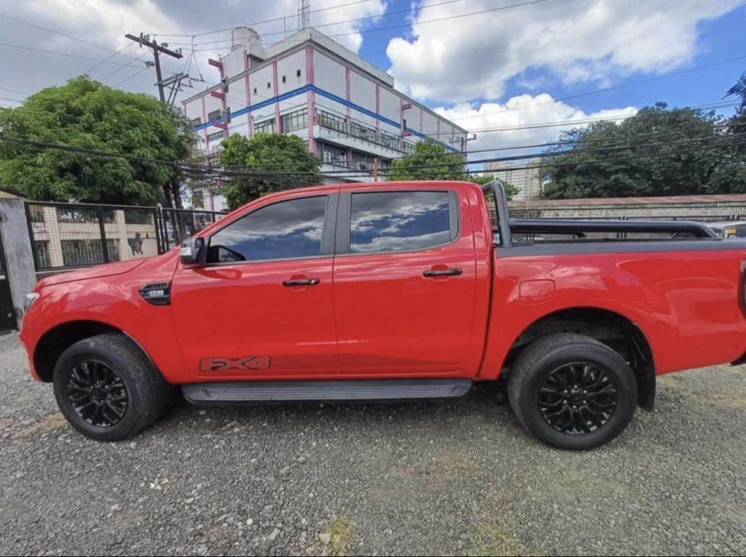 Ford Ranger (Category: Used Cars) located in Marikina City. Submitted by boutiquekoh (Listing ID 1469510031, Image 3). Description: FOR SALE: Ford Ranger FX4 2021 2WD AT❤️🚗 Well loved and ready for a new owner! Details: -Wednesday coding • Red in color • Makinis • All stock • Casa maintained • Never flooded • No issues, ready to drive Extras: • With roll-up trunk cover w/ lock (needs minor repair – loose lock) • LTO registered until 2026 Ownersh